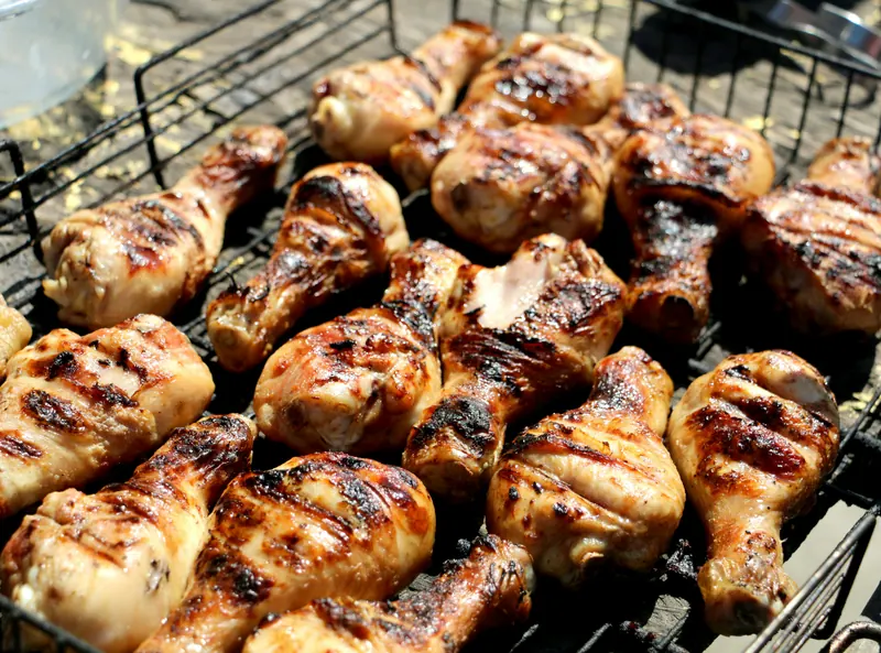 Jerk chicken legs on the grill